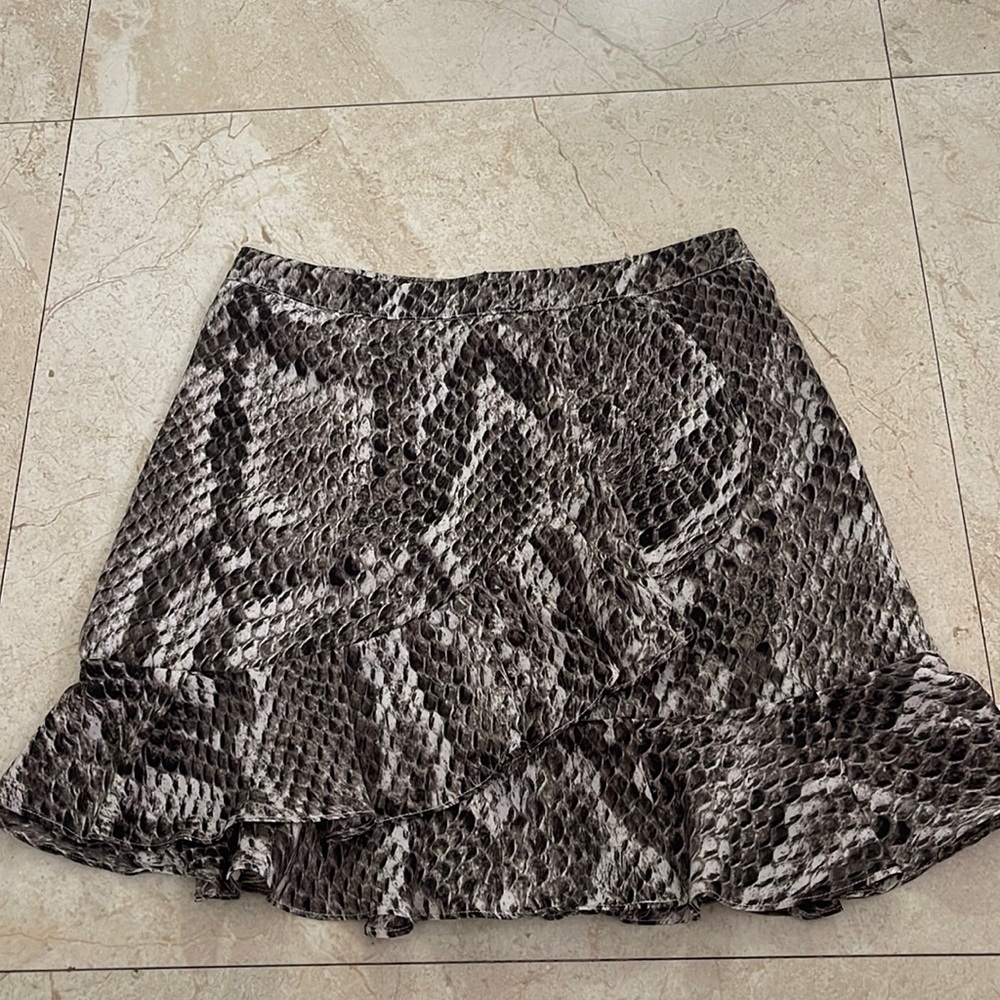 Snake print, gorgeous, size small dress. Can be dressed up or down.